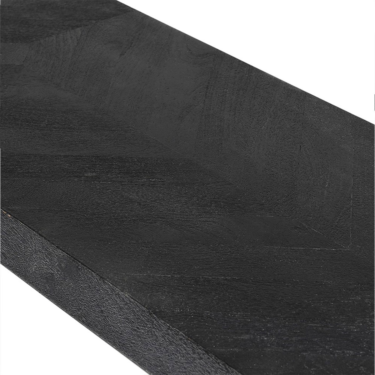 Close-up of a dark wooden surface with visible grain and texture.