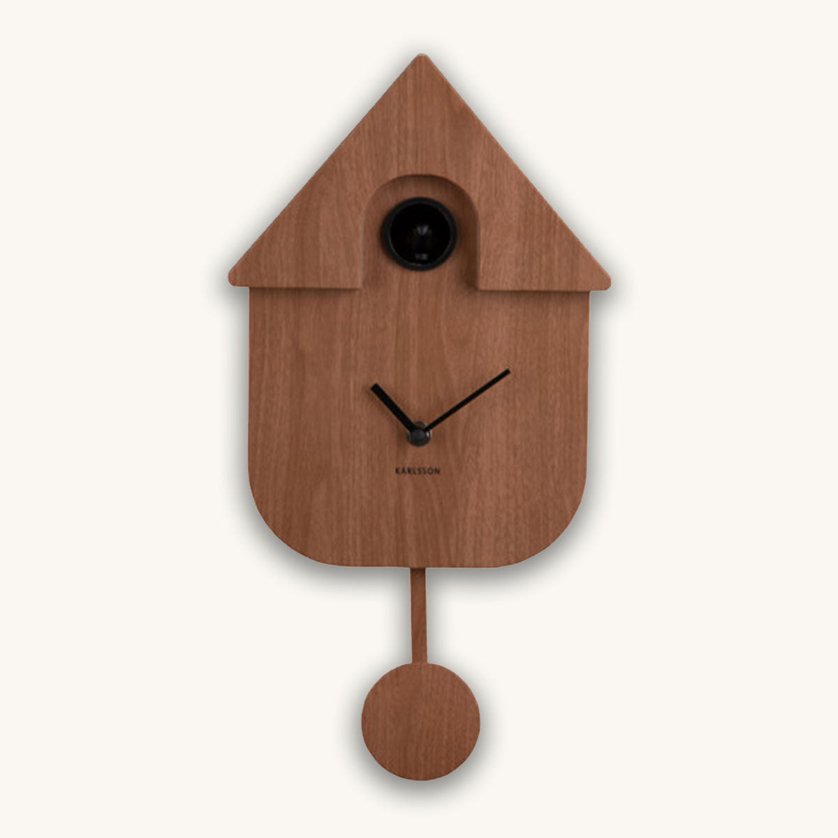 Wooden cuckoo clock with a white background
