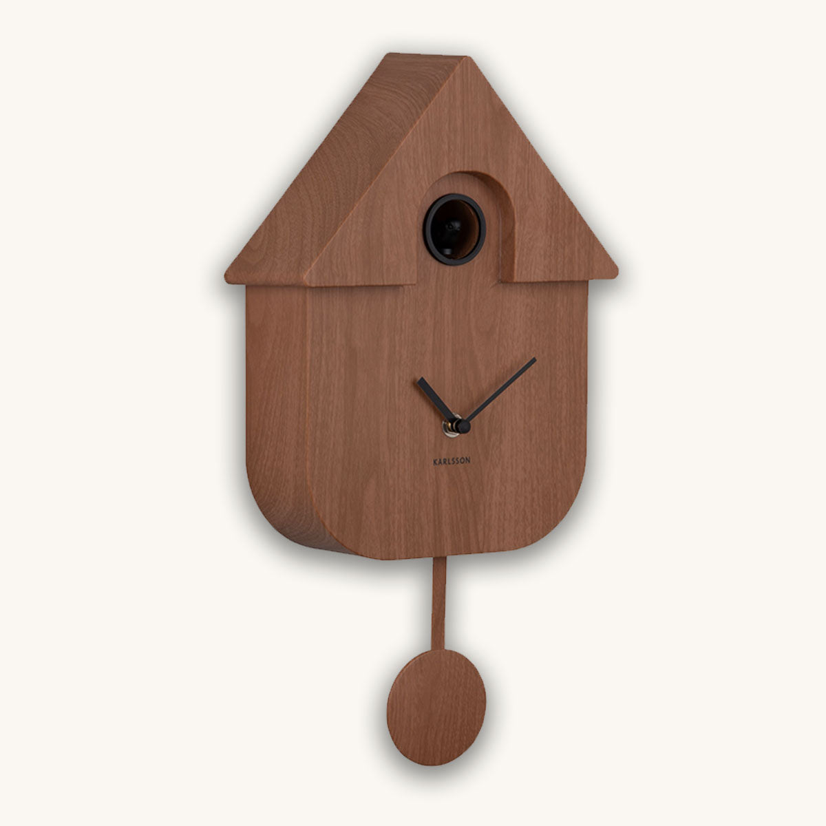 Wooden cuckoo clock with a white background