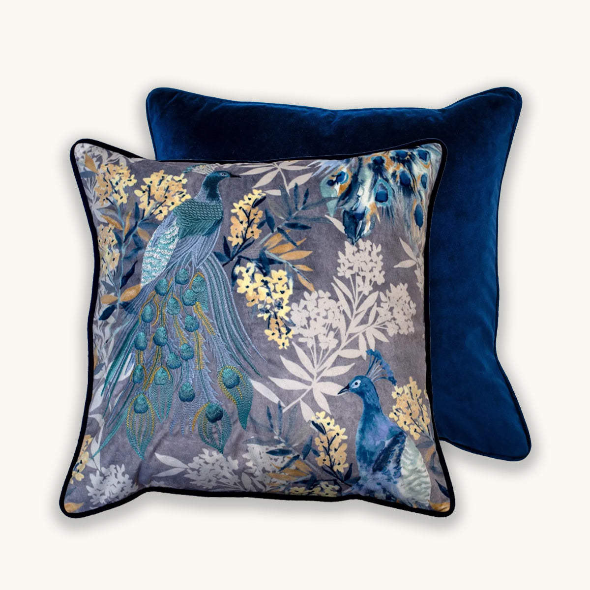 Decorative pillows with peacock design on a white background