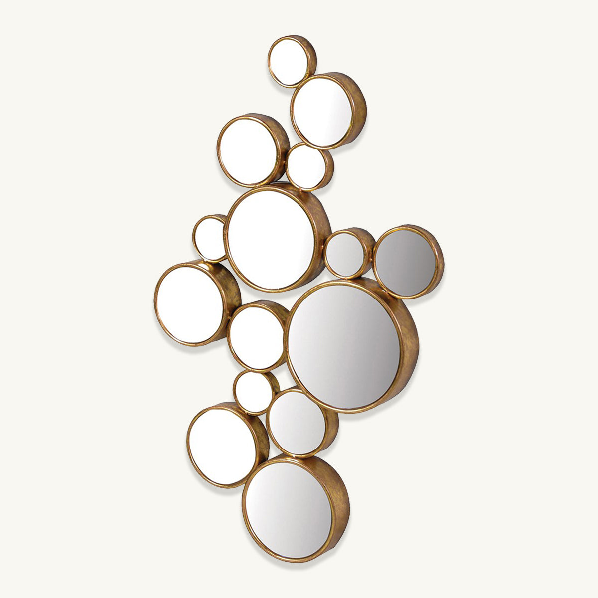 A unique shaped mirror made up of a cluster of gold mirrored circles.