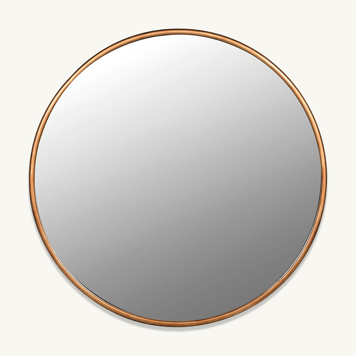 A gold narrow frame mirror in a circular shape.