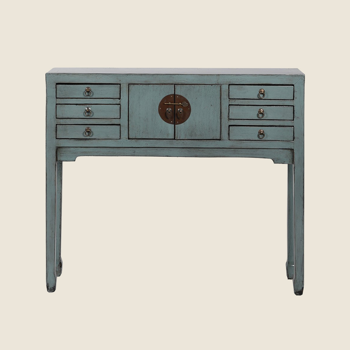 Distressed blue-gray vintage console table with six drawers, central cabinet, brass hardware, and slender legs on a neutral background.