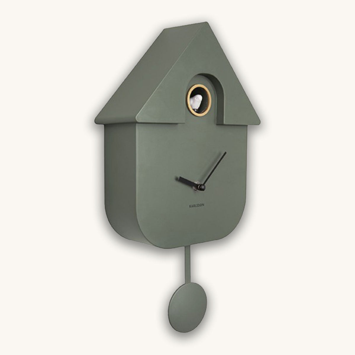 Green cuckoo clock with a white background