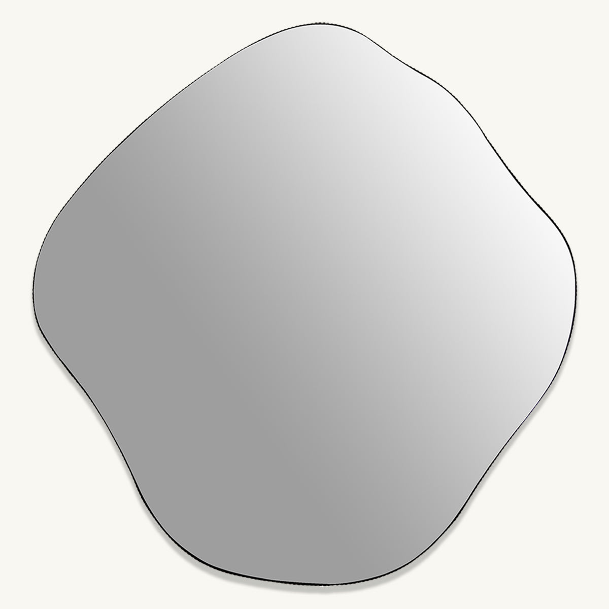 A wavy edge mirror with a deep ridged frame in natural oak.