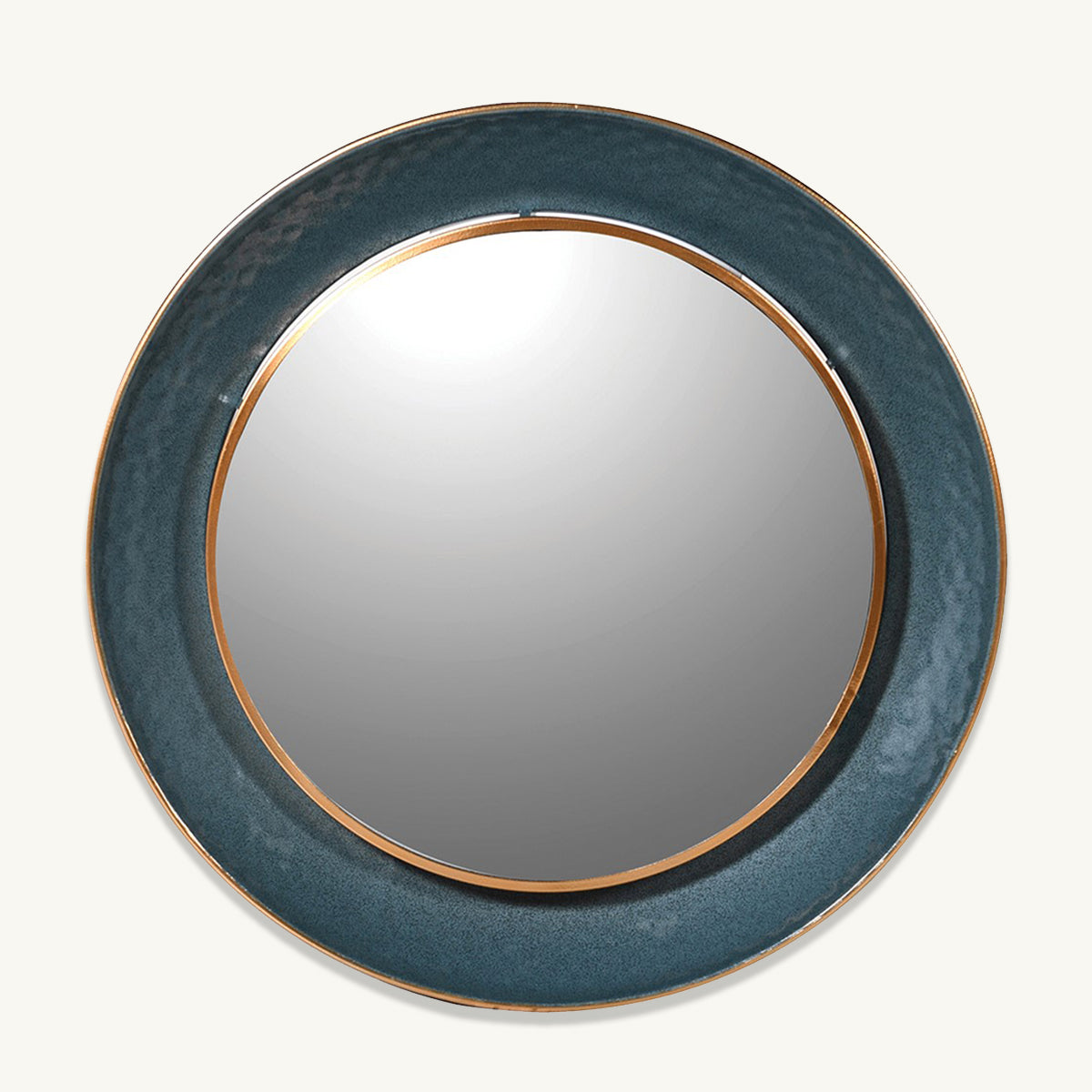 A circular wall mirror with a teal and gold frame, and a hammered metal texture.