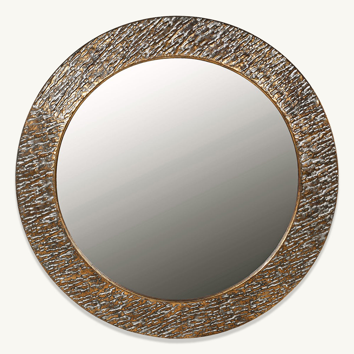 A round mirror with a deep gold circular frame with a hammered metal finish.