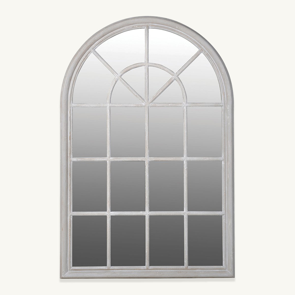 A pale grey distressed window shaped mirror, complete with an arched top and grid frame.