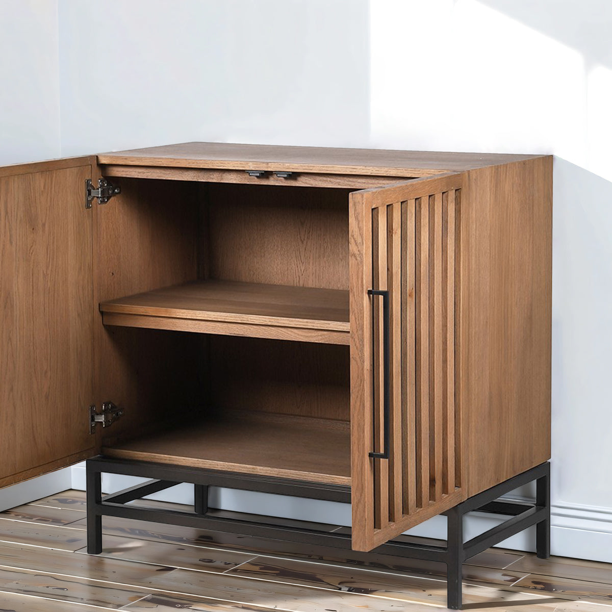 Wooden cabinet with open doors on a wooden floor.