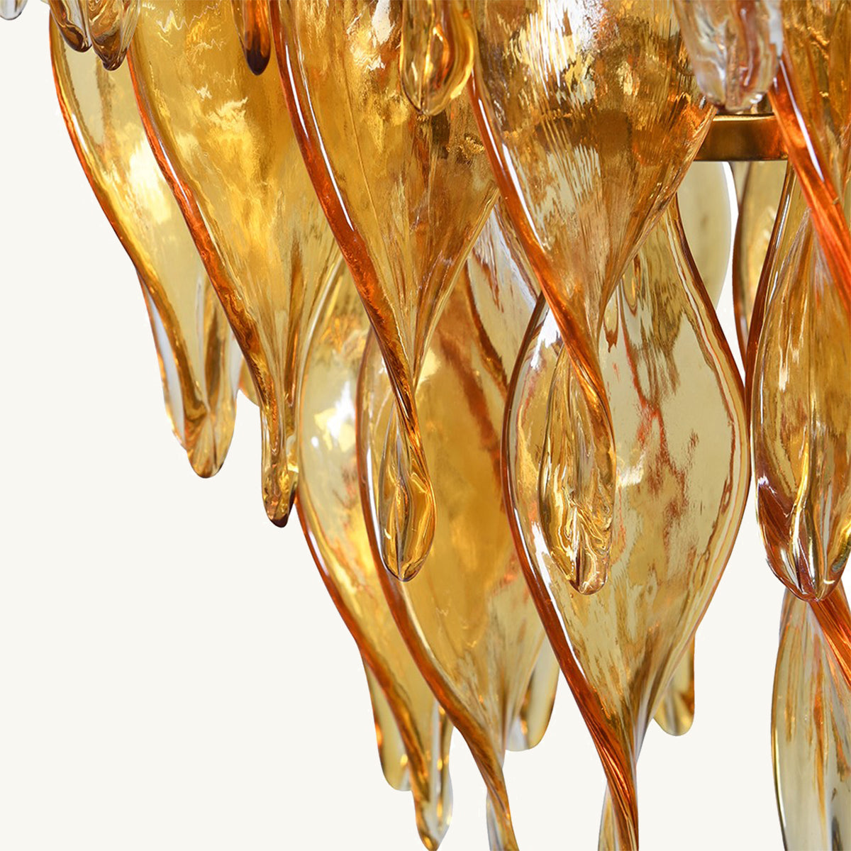 Gold and amber glass chandelier on a white background