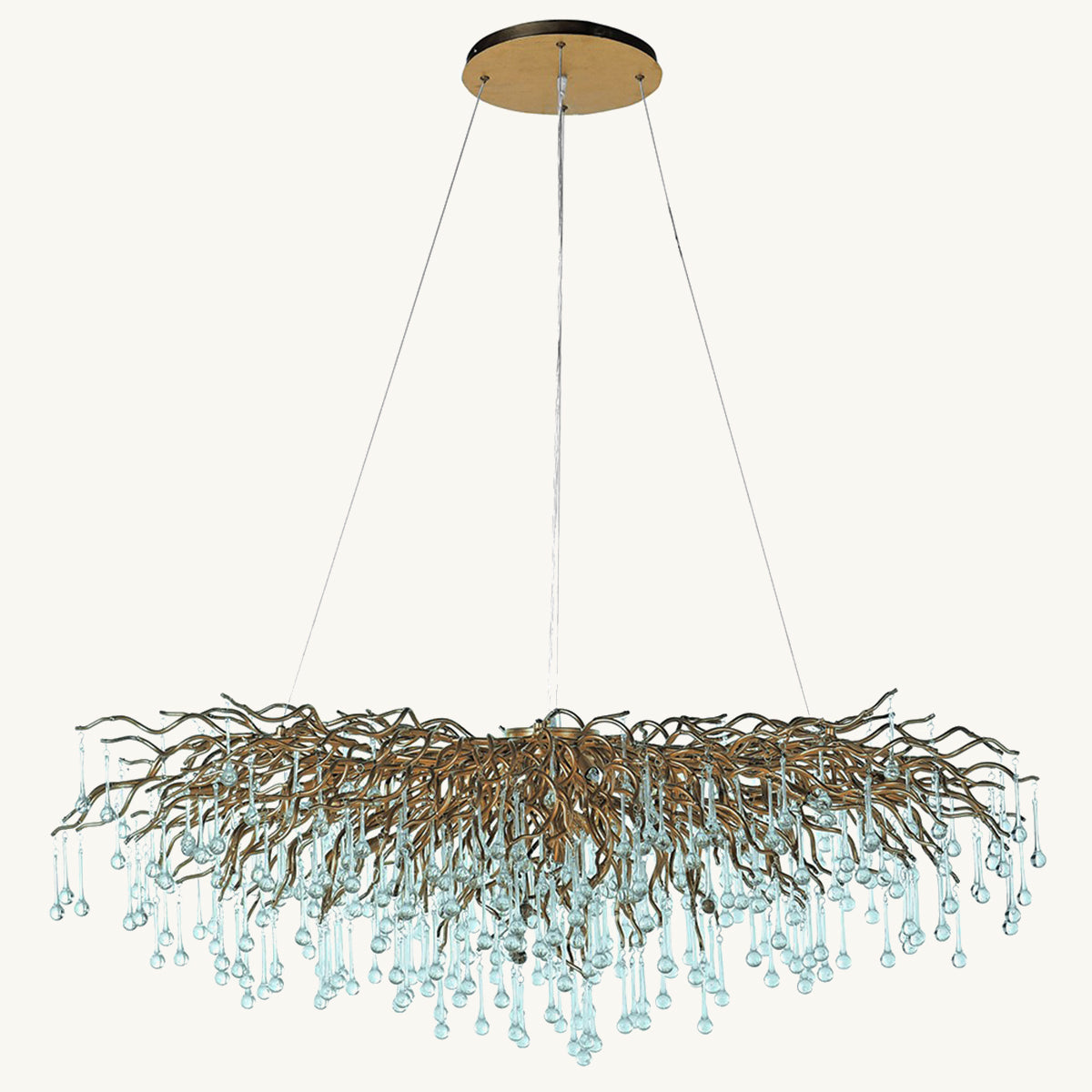 A luxurious Gold Water Droplet Chandelier with intertwined golden branches and hanging clear glass droplets, suspended by a circular base.