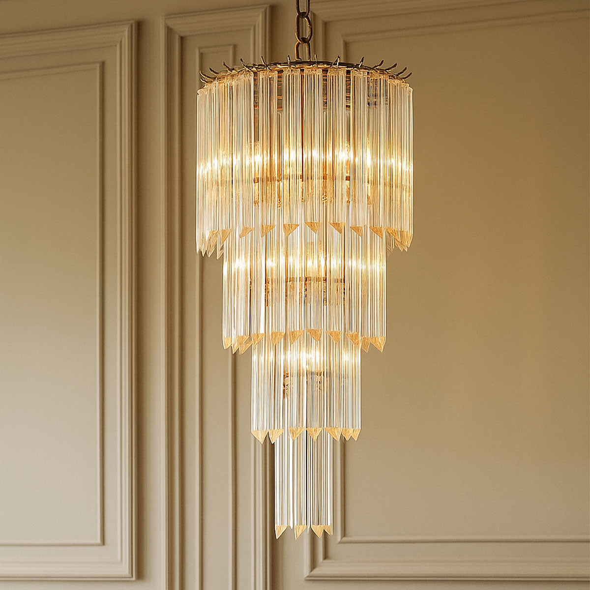Chandelier hanging against a beige wall