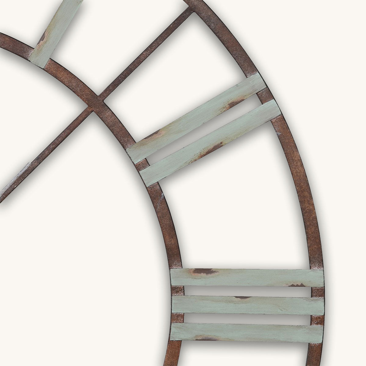 Decorative wall clock with a skeletal design on a white background