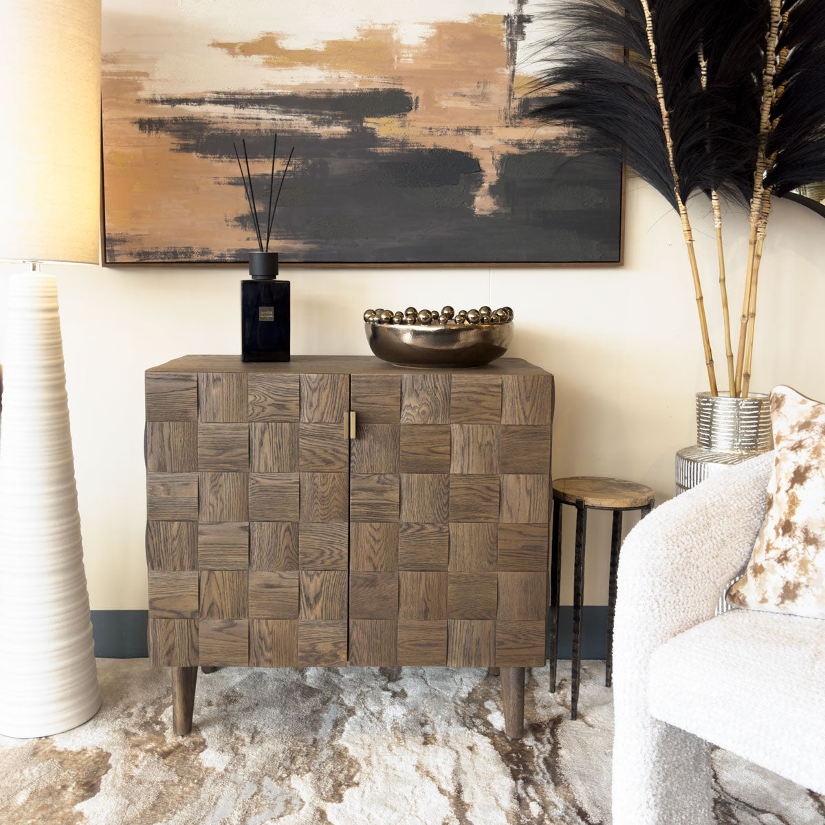 Wooden parquet sideboard with decorative items in a living room setting