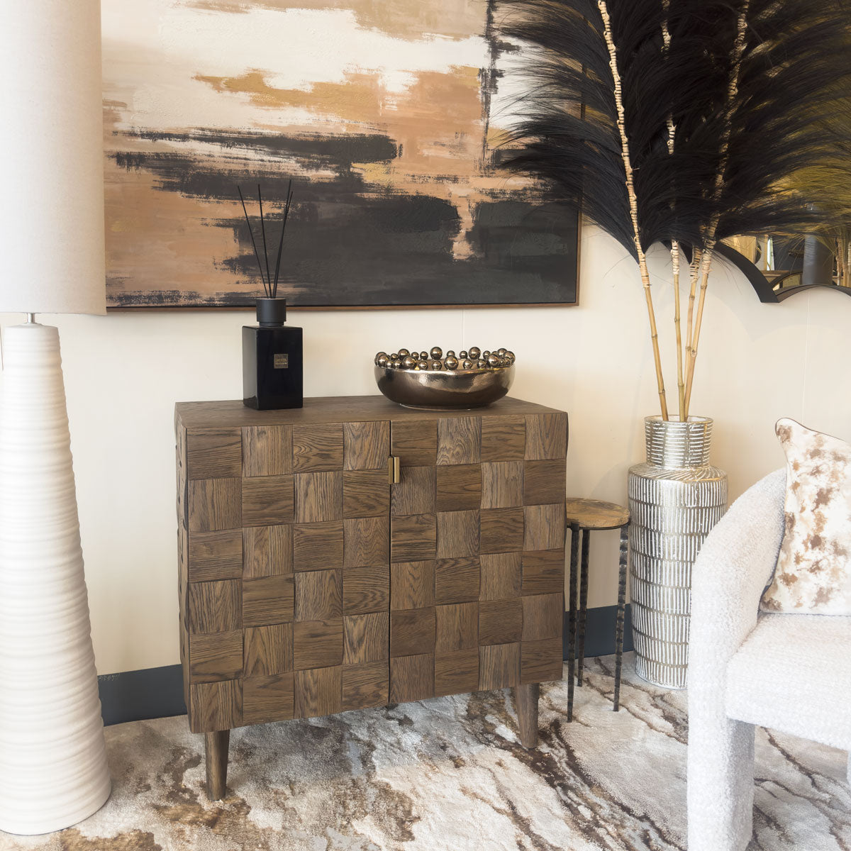 Wooden sideboard with decorative items in a stylish room