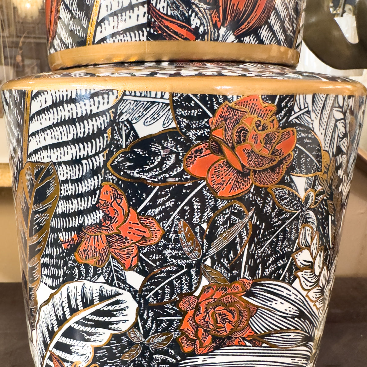 Decorative ginger jar with floral and leaf pattern