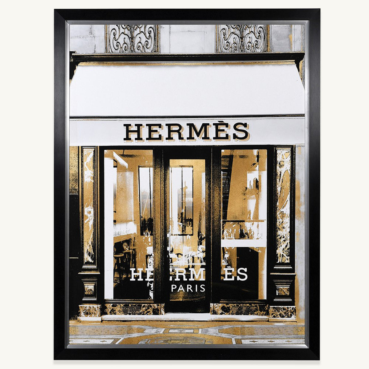 A framed artwork of a Parisian designer storefront in monochrome and gold tones.
