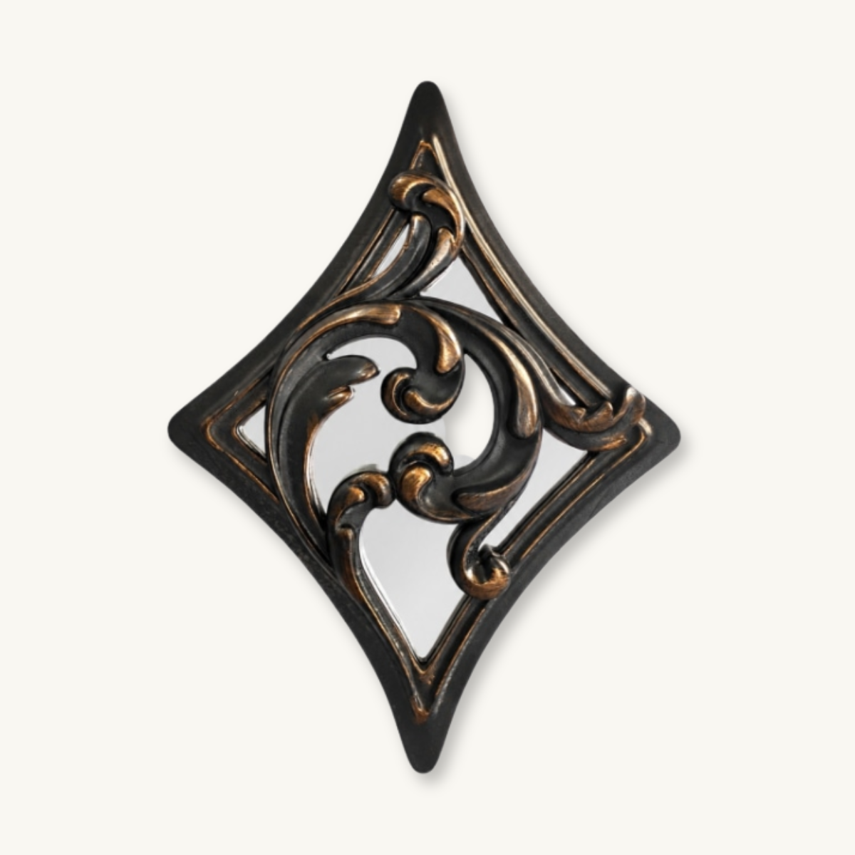 Ornate black-and-bronze diamond-shaped mirror with curling scrollwork, photographed on white; its intricate design feels elegant and antique.