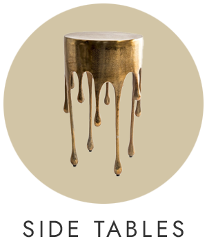 Gold side table with a dripping design on a beige background