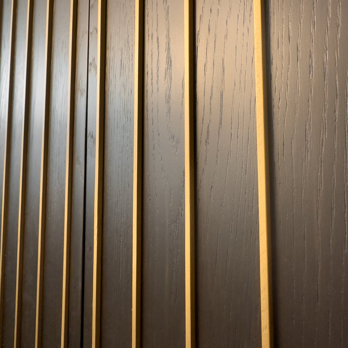 Wooden panel with vertical slats and a textured finish