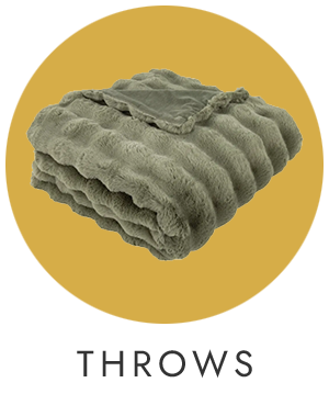 Folded green throw blanket on a yellow background with 'THROWS' text below.