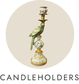 Decorative candleholder with a parrot design on a beige background